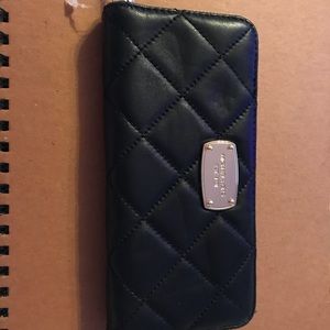 Michael Korda wallet